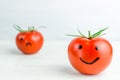 different emotions on tomatoes. Joy. Anger. Sadness