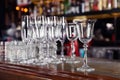 Different empty clean glasses on counter Royalty Free Stock Photo