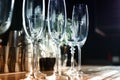 Different empty clean glasses on counter in bar Royalty Free Stock Photo
