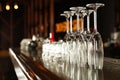 Different empty clean glasses on counter in bar Royalty Free Stock Photo