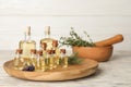 Different essential oils in glass bottles