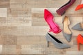 Different female shoes on floor Royalty Free Stock Photo