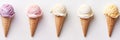 Different flavored ice cream cones lined up on white background banner. Panoramic web header. Wide screen wallpaper