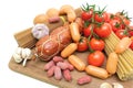 Different foods on a cutting board on a white background