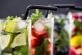 Different fresh lemonades in glasses with ice cubes Royalty Free Stock Photo