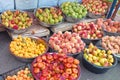 Different fresh local fruit (apples, pears, peaches and apricots) at a farmer organic grocery market Royalty Free Stock Photo