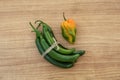 Different fresh ripe peppers on wooden table, flat lay Royalty Free Stock Photo