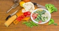 Various frozen and fresh vegetables on a cooking table Royalty Free Stock Photo