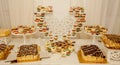 Different fruit desserts with fruits in glasses on the table. Restaurant presentation, food, party concept