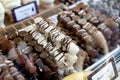 Different fruit sticks: Fresh strawberries,bananas covered with white and dark chocolate for sale on local market place in Vienna.