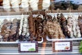 Different fruit sticks: Fresh strawberries,bananas covered with white and dark chocolate for sale on local market place in Vienna