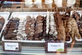 Different fruit sticks: Fresh strawberries,bananas covered with white and dark chocolate for sale on local market place in Vienna