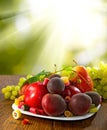 different fruits and sweets on wooden table close-up Royalty Free Stock Photo