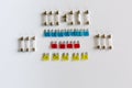 Different fuses for a car on whit surface