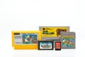 Different generation of Nintendo super mario bros game cartridges