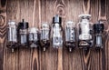 Different generations of electronic vacuum tubes. closeup view. Royalty Free Stock Photo