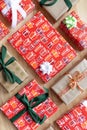 Different gift boxes wrapped with ribbons and bows on wooden background Royalty Free Stock Photo