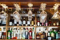 Different glasses hanging over the bar. Soft focus. selective focus. Royalty Free Stock Photo