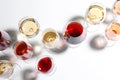 Different glasses with wine on white background