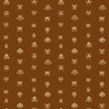 Different gold mask tribal symbols on brown background. Royalty Free Stock Photo