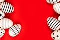 Different graphic hand-painted eggs on bright red background. Royalty Free Stock Photo