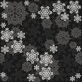 Different gray messy snowflakes on dark