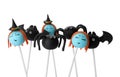 Different Halloween themed cake pops on background