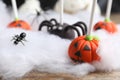 Different Halloween themed cake pops on table