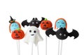 Different Halloween themed cake pops on background