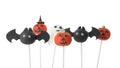 Different Halloween themed cake pops on background