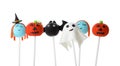 Different Halloween themed cake pops on background