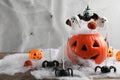 Different Halloween themed cake pops on wooden table Royalty Free Stock Photo