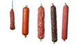 Different hanging sausages isolated on background Royalty Free Stock Photo