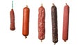 Different hanging sausages isolated on background