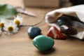 Different healing gemstones on wooden table