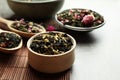 Different herbal teas on grey table, closeup Royalty Free Stock Photo