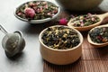 Different herbal teas on grey table, closeup Royalty Free Stock Photo