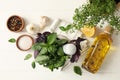 Different herbs, oil and spices on wooden background, top view Royalty Free Stock Photo