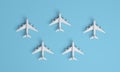 Different holiday or business trip destinations, airplanes on a blue background