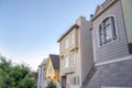 Different home exteriors in San Francisco, California against the sunset sky background