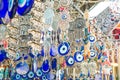 Different jewish souvenirs as Hamsa with Shalom Peace and other sale at the popular marketplace in Tel Aviv, Israel. Selective f