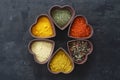 Different kind of spices on a black stone. Royalty Free Stock Photo