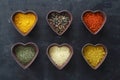 Different kind of spices on a black stone. Royalty Free Stock Photo