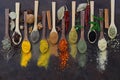 Different kind of spices on a wood background. Royalty Free Stock Photo