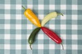 Different kinds of chili peppers on the table Royalty Free Stock Photo