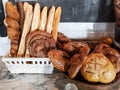 Different kinds of fresh bread displayed on a table Royalty Free Stock Photo