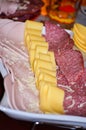 Different kinds of ham and cheese gauda arranged ready to be served for a party Royalty Free Stock Photo