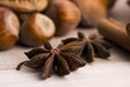 Different kinds of spices, nuts and dried oranges Royalty Free Stock Photo