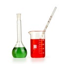 Different laboratory glassware with colored liquid isolated Royalty Free Stock Photo