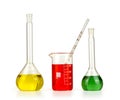 Different laboratory glassware with colored liquid isolated Royalty Free Stock Photo